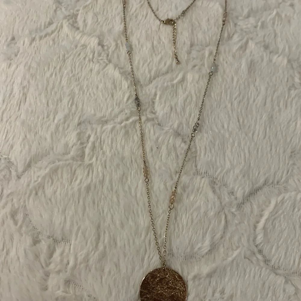 Disc‎ pendant necklace with some little beads on chain.Beautiful and sparkly.